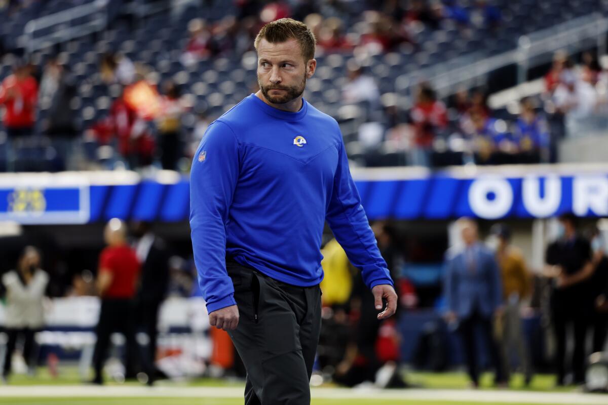 Rams head coach Sean McVay watches the Rams warmup before facing the San Francisco 49ers.