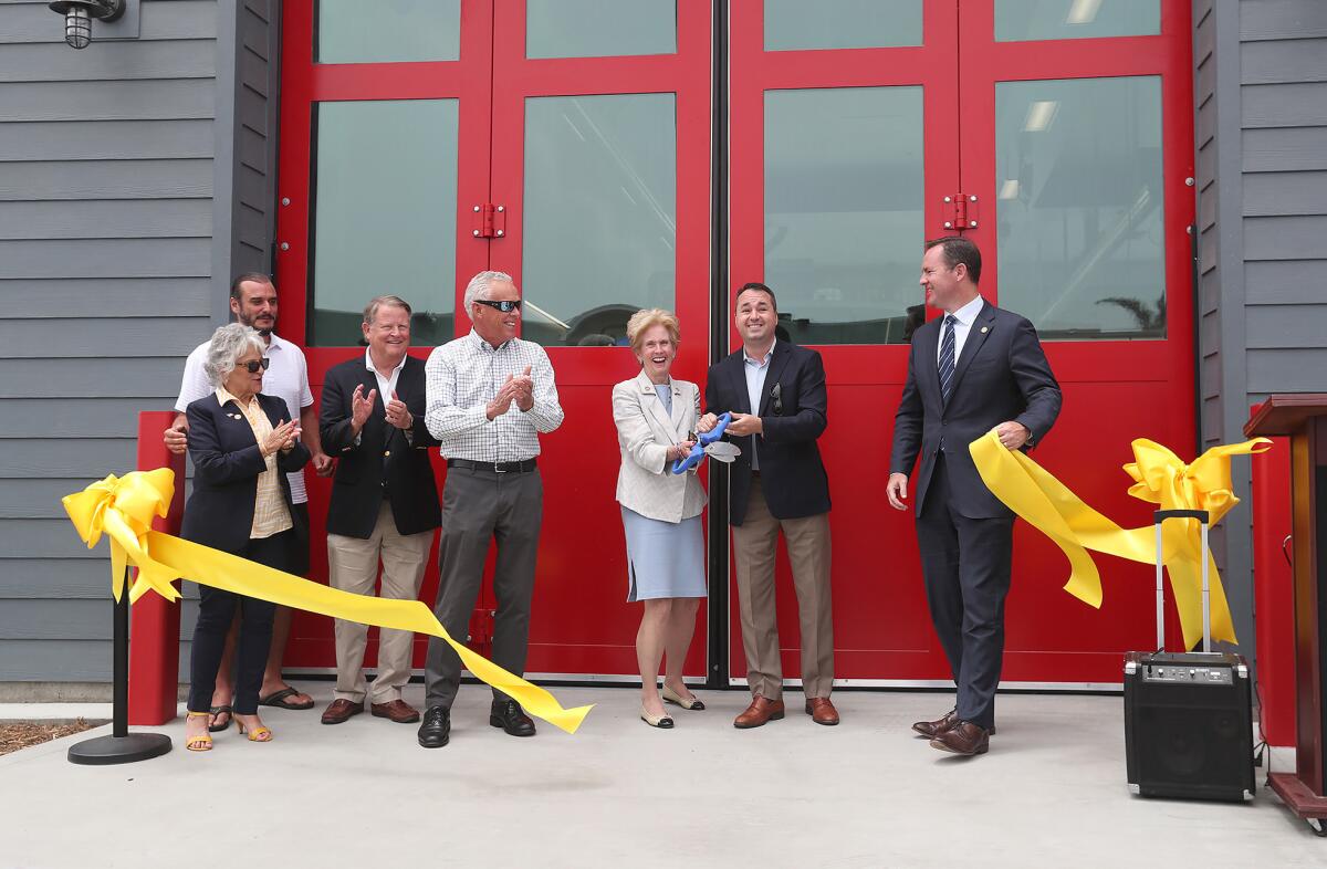 Newport Beach City Council members cut the ribbon to officially open the new Peninsula Fire Station No. 2.