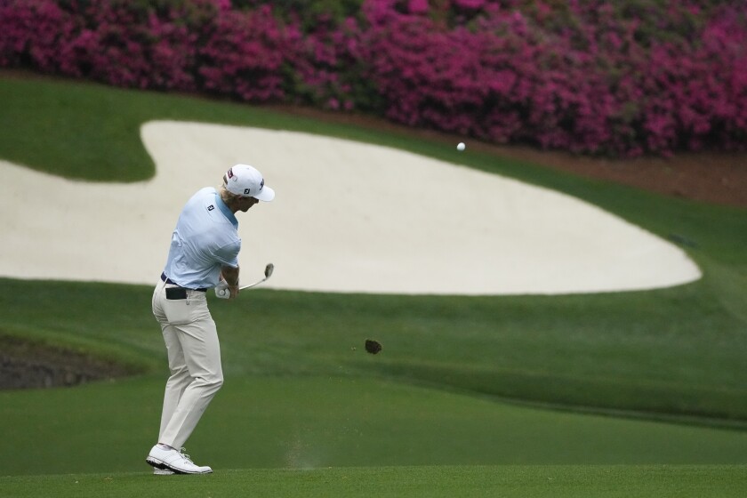 Will Zalatoris chips to the 13th green during the third round of the Masters golf tournament on Saturday, April 10, 2021, in Augusta, Ga. (AP Photo/Charlie Riedel)