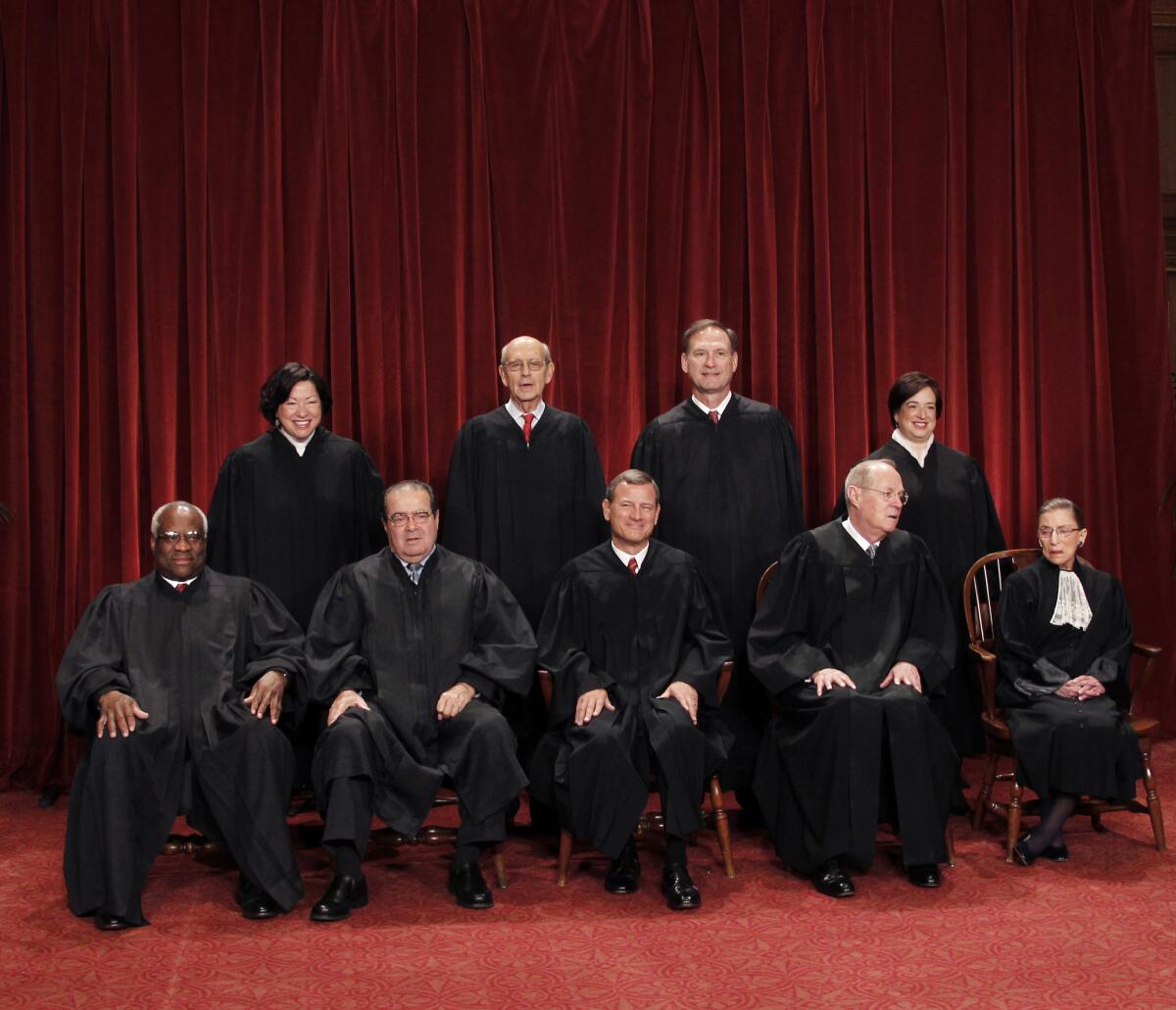 The justices of the U.S. Supreme Court in a group portrait at the Supreme Court Building in Washington on October 8, 2010.