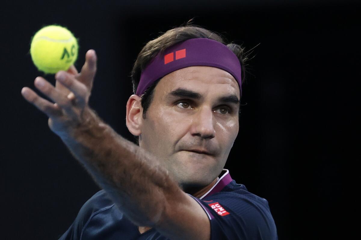 Swiss tennis star Roger Federer preparing to serve
