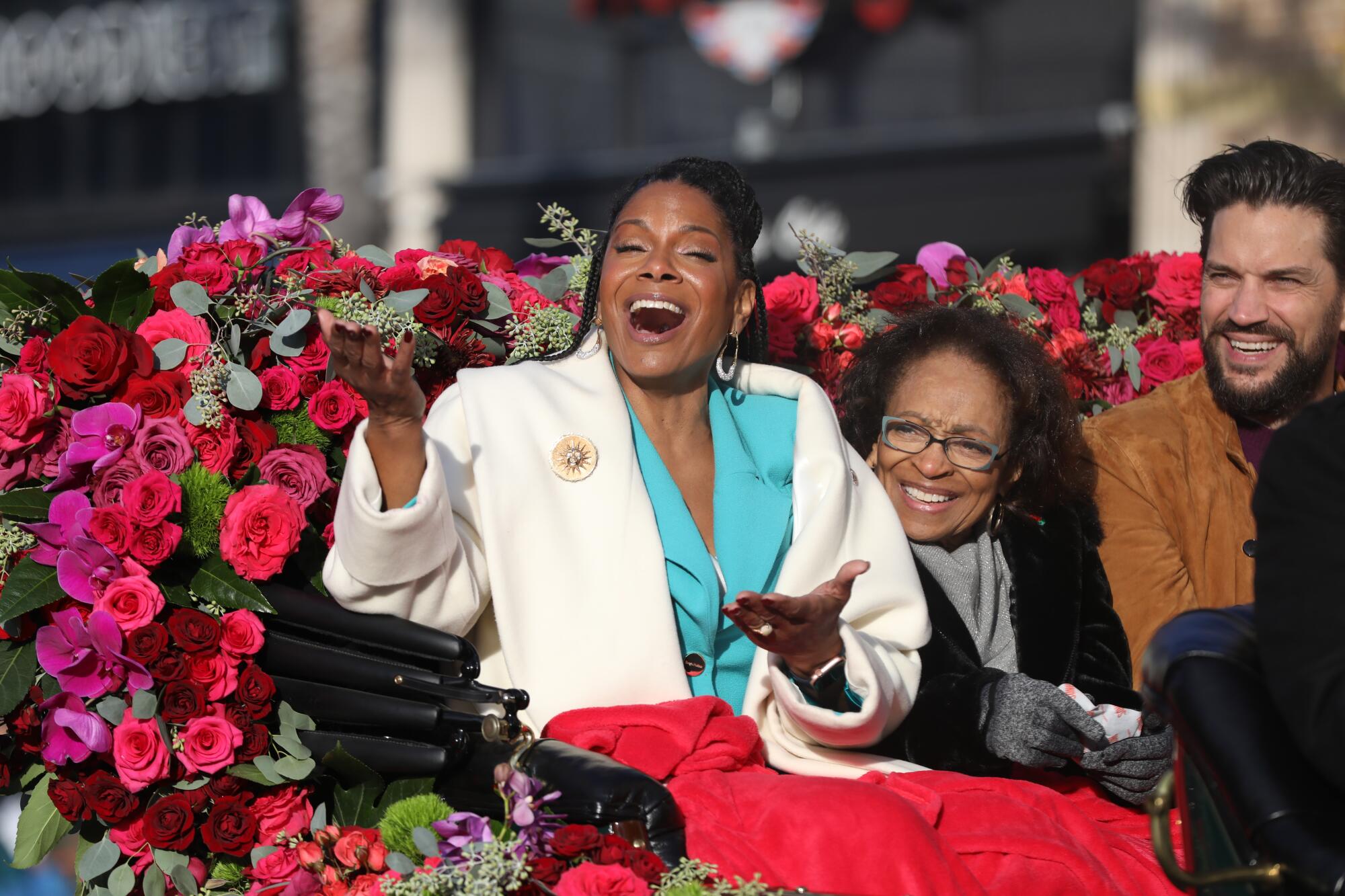 Rose Parade Grand Marshall and Singer Audra McDonald smiles for the crowd