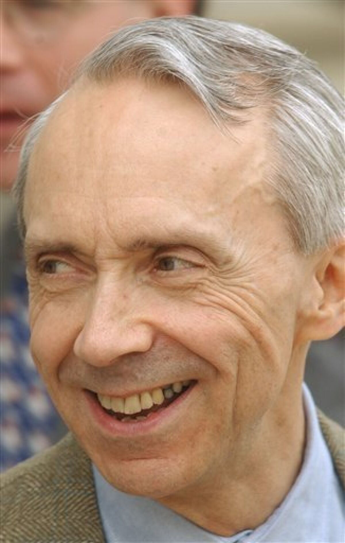 FILE - In this April 7, 2005 file photo, U.S. Supreme Court Justice David Souter talks with friends in Concord, N.H., while he visited his native New Hampshire on break from the court. (AP Photo/Jim Cole, File)