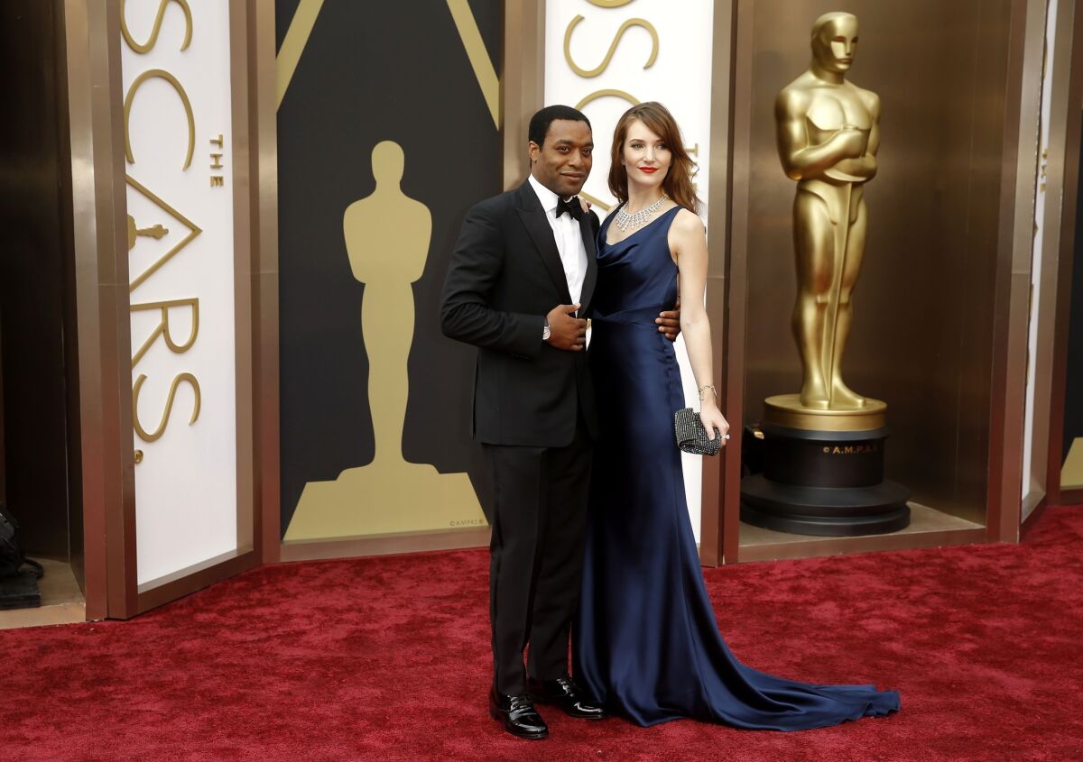 "12 Years a Slave" lead actor nominee Chiwetel Ejiofor and Sari Mercer