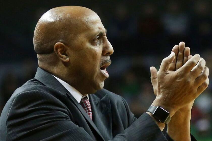 Arizona interim head coach Lorenzo Romar encourages his team during an NCAA college basketball game against Oregon after Arizona head coach Sean Miller was suspended for the game Saturday, Feb. 24, 2018, in Eugene, Ore. (AP photo/Chris Pietsch)