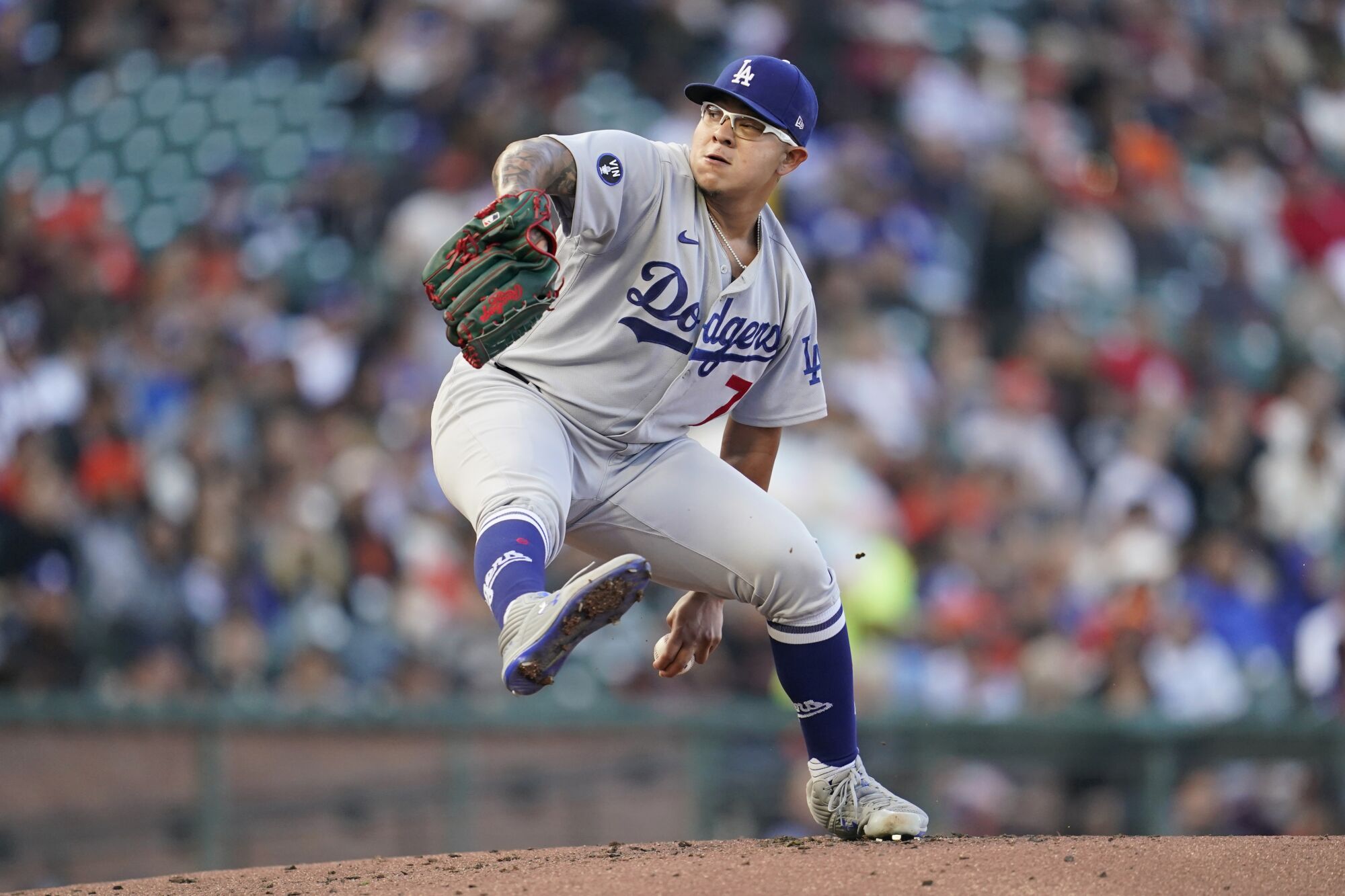 Julio Urías pitches against the Giants on Aug. 3 in San Francisco.