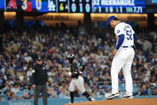 LOS ANGELES, CALIFORNIA May 9, 2024- Dodgers pitcher Elieser Hernandez gives ups a solo home run to Diamondbacks Christian Walker in the sixth inning at Dodger Stadium Wednesday. (Wally Skalij/Los Angeles Times)