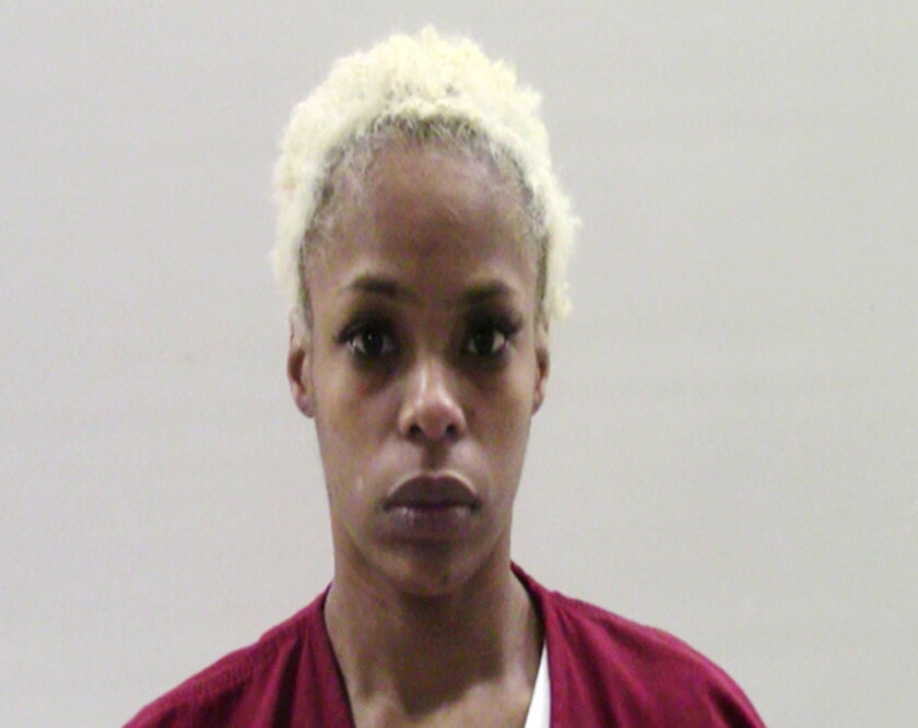 This photo released by the Cameron County Sheriff's Office shows Valeria Smith. The woman who pleaded guilty to helping her father cover up his wife's 2018 murder with a tale of a knife-wielding panhandler has been sentenced to five years in prison. Valeria Smith was sentenced Monday, Dec. 13, 2021 two years after pleading guilty to acting as an accessory after the slaying of Jacquelyn Smith, admitting that she ditched her stepmother’s purse at a bus stop to support the panhandler story, The Baltimore Sun reported. (Cameron County Sheriff's Office via AP)