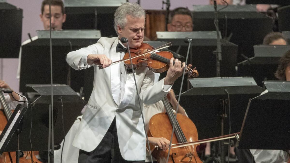 Principal concertmaster Martin Chalifour performs at the Hollywood Bowl on Thursday.