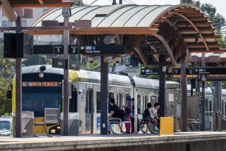 LOS ANGELES, CA - JULY 23: The Metro Gold Line picks up and drops off passengers at the Pico/Aliso stop in Los Angeles on Tuesday, July 23, 2024. For 19 straight months, Metro ridership is on the rise hitting over 85 percent of pre-COVID June 2019 levels. (Myung J. Chun / Los Angeles Times)