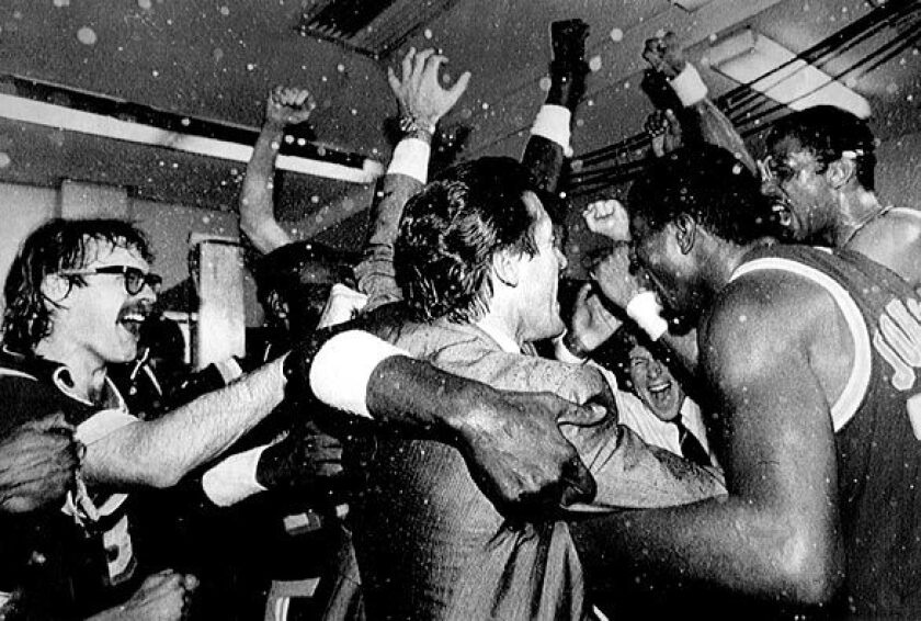 Lakers celebrate in the locker room after beating the Boston Celtics in Game 6 to win the 1985 NBA Finals on June 9, 1985.