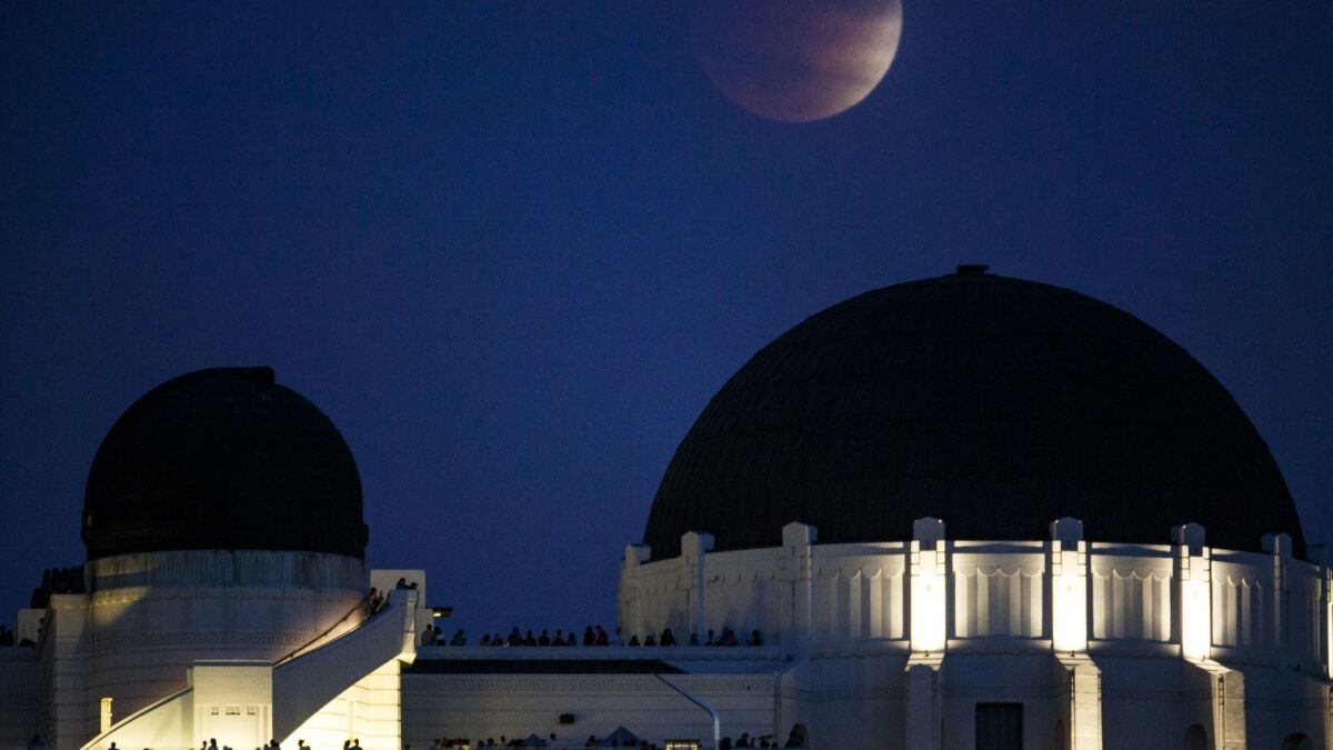 Moonrise over the Griffith Observatory.
