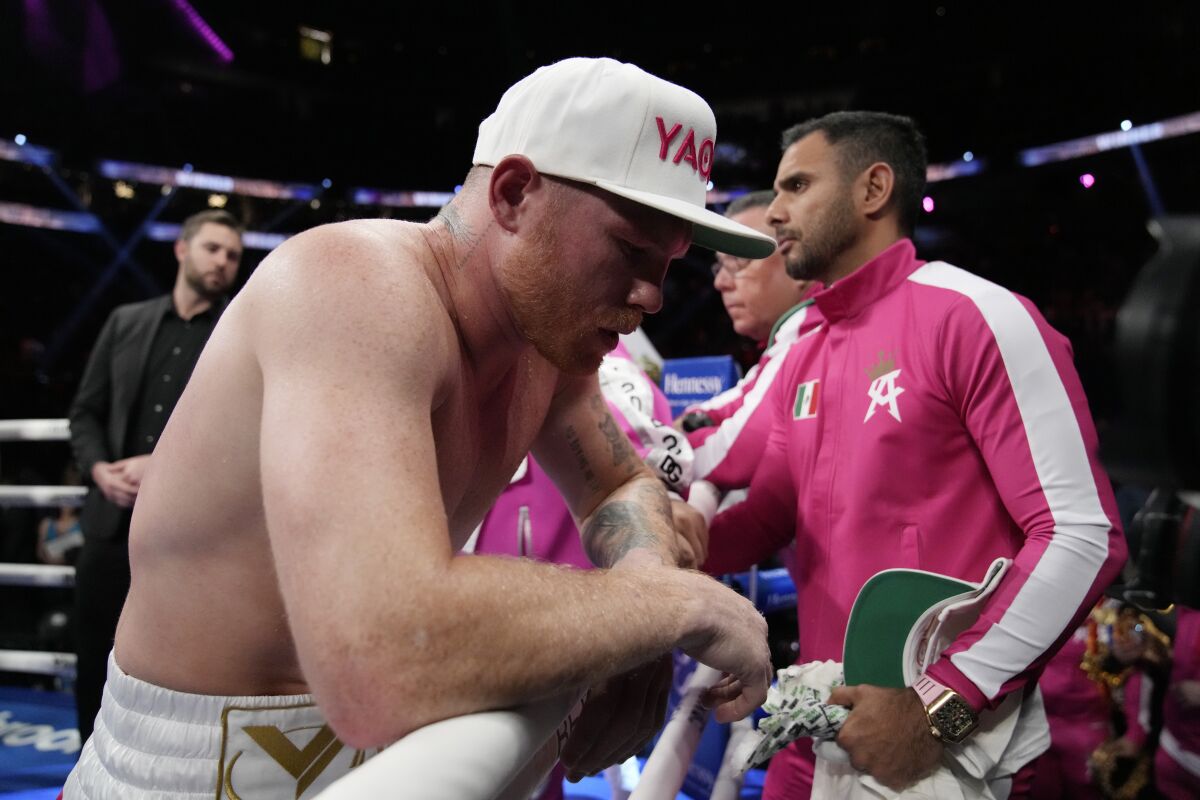 Canelo Álvarez reacts after losing by unanimous decision to Dmitry Bivol on Saturday.