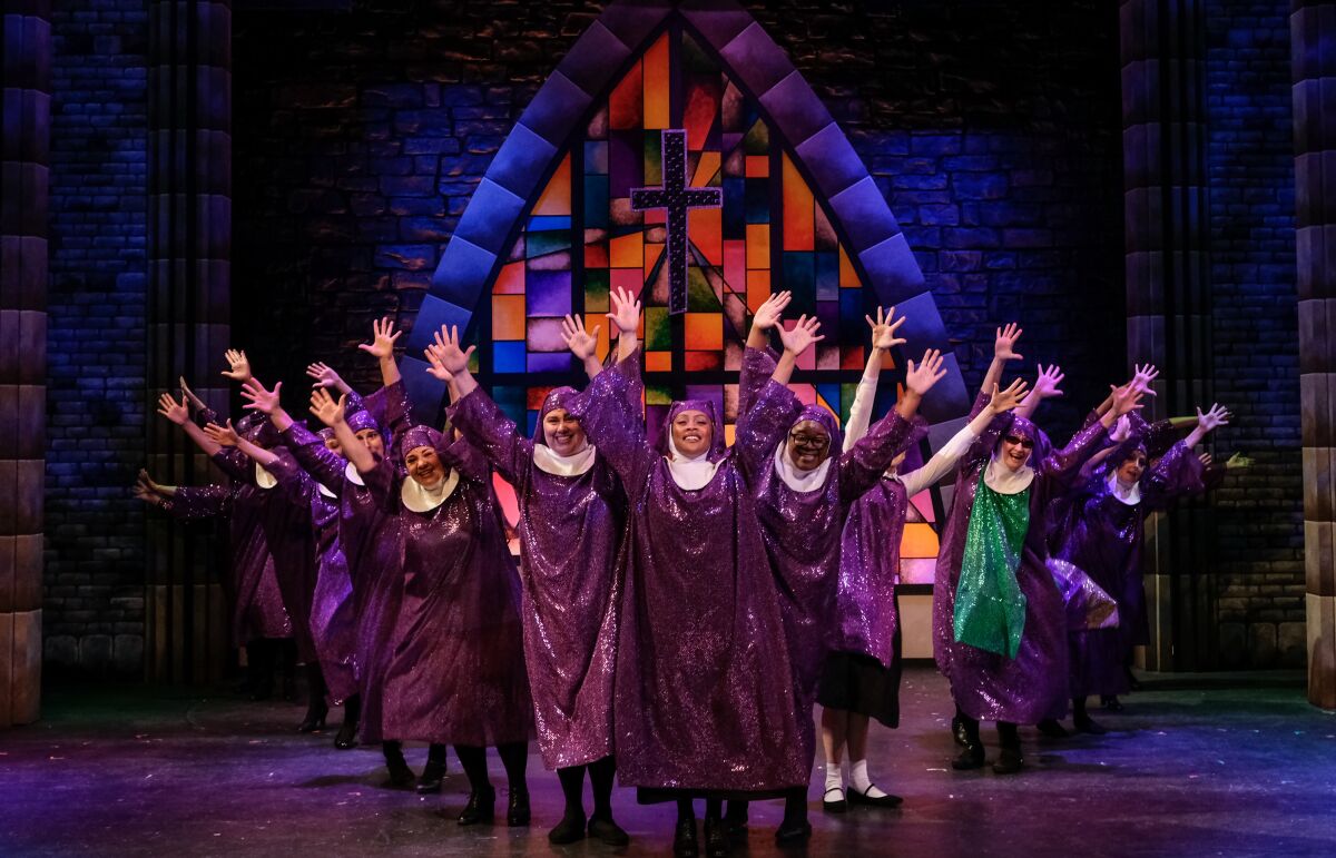 Miriam Dance (center) and the cast of San Diego Musical Theatre's "Sister Act."
