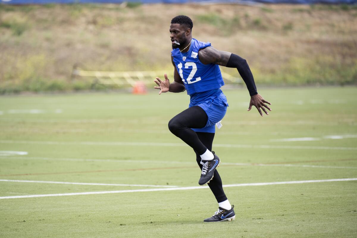 Rams wide receiver Van Jefferson (12) warms up during their last minicamp camp in Thousand Oaks.