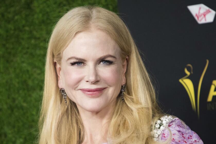 FILE - In this Jan. 5, 2018 file photo, Nicole Kidman appears at the 7th annual AACTA International Awards in Los Angeles. Amazon Studios says itâs signed a deal with Kidman and her production company for TV and movie projects. Under the âfirst-lookâ deal, Amazon and Kidmanâs Blossom Films will develop original series for Amazon Prime Video and big-screen films. (Photo by Vianney Le Caer/Invision/AP, File)