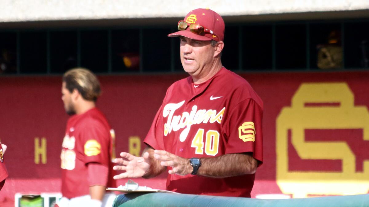 USC Coach Dan Hubbs argues a call with an umpire during a March game at Dedeaux Field.