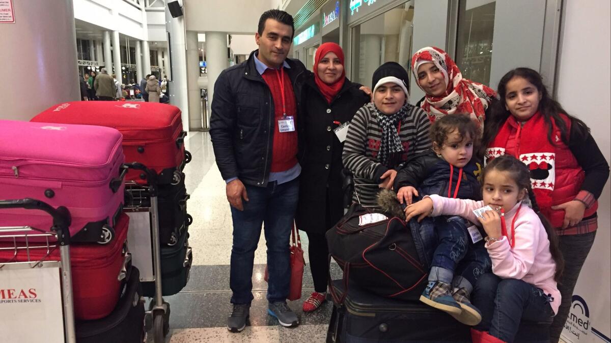 Mohammed Ali, wife Kinda Nonoo and their children, Ali, 14; Mais, 15; Bader, 2; Ghima, 7; and Ghazal, 11, wait in the Beirut airport for their flight to Italy on Feb 26, 2017.