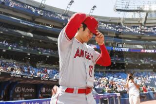Los Angeles Angels designated hitter Shohei Ohtani (17) takes the field ahead of a baseball game against the Toronto Blue Jays in Toronto, Sunday, July 30, 2023. (Cole Burston/The Canadian Press via AP)