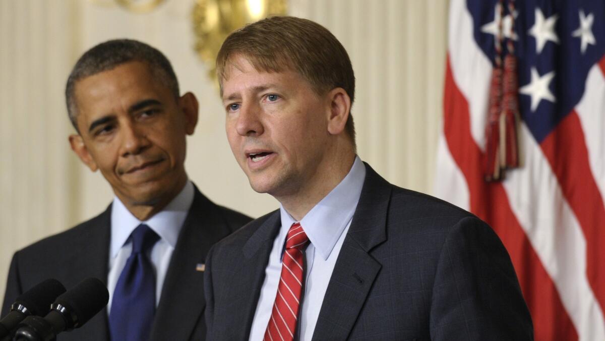 Richard Cordray, right, was appointed by then-President Obama as the first director of the Consumer Financial Protection Bureau. He calls Gov. Gavin Newsom's proposal for creating California's own watchdog agency "a commendably bold step."