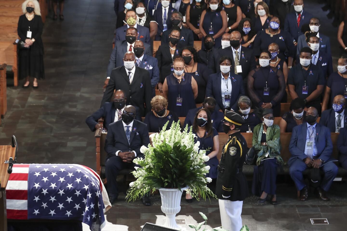 Mourners attend the funeral service for Rep. John Lewis at Ebenezer Baptist Church in Atlanta.