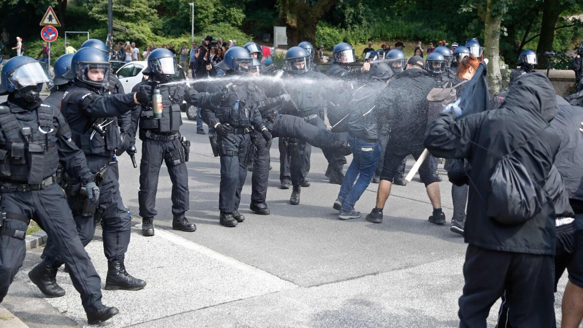 Riot police use pepper spray against protesters in Hamburg, Germany, on July 7.