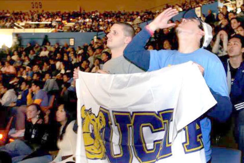 UCLA fans in Pauley Pavilion show disappointment while watching the Bruins play Florida in Indianapolis for the NCAA championship. The Gators won, 73-57.