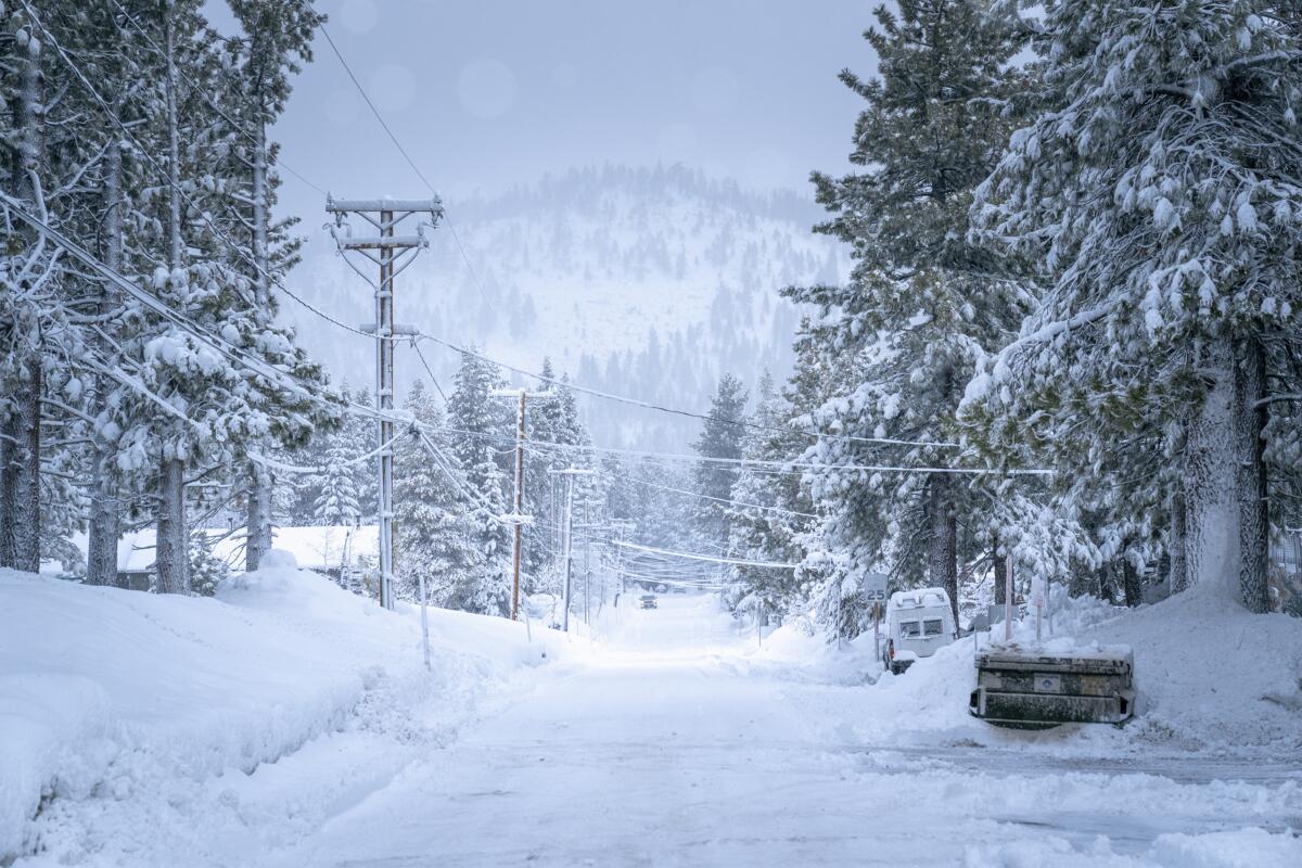 A roadway is covered with snow in Mammoth Lakes, Calif., on Feb. 19.
