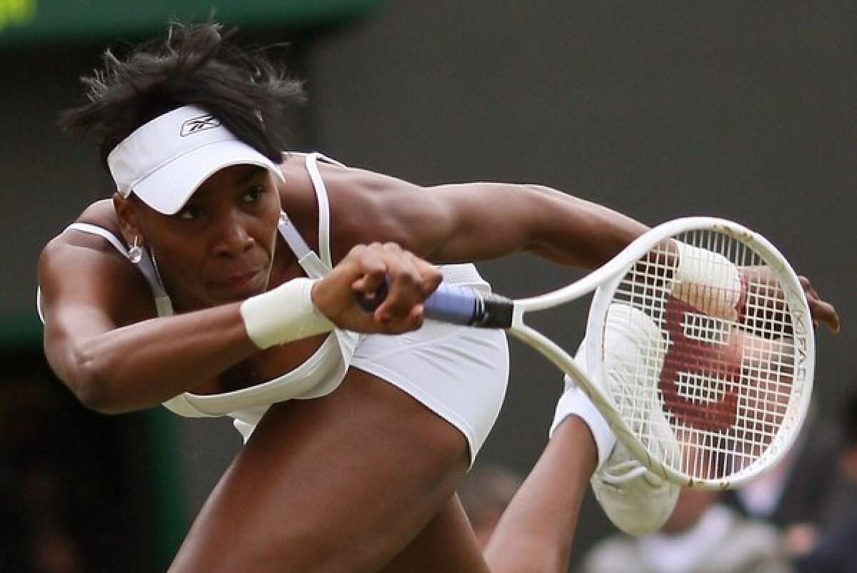 Venus Williams is seen in action at the Wimbledon Championships in 2007, the first time the tournament paid the women's singles winner the same as the men's singles winner, a change that followed her advocacy the previous year. She won the women's singles title.
