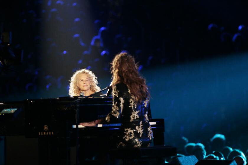 Carole King, left, and Sara Bareilles perform "Beautiful" and "Brave" at the 56th Grammy Awards at Staples Center in Los Angeles on Sunday.