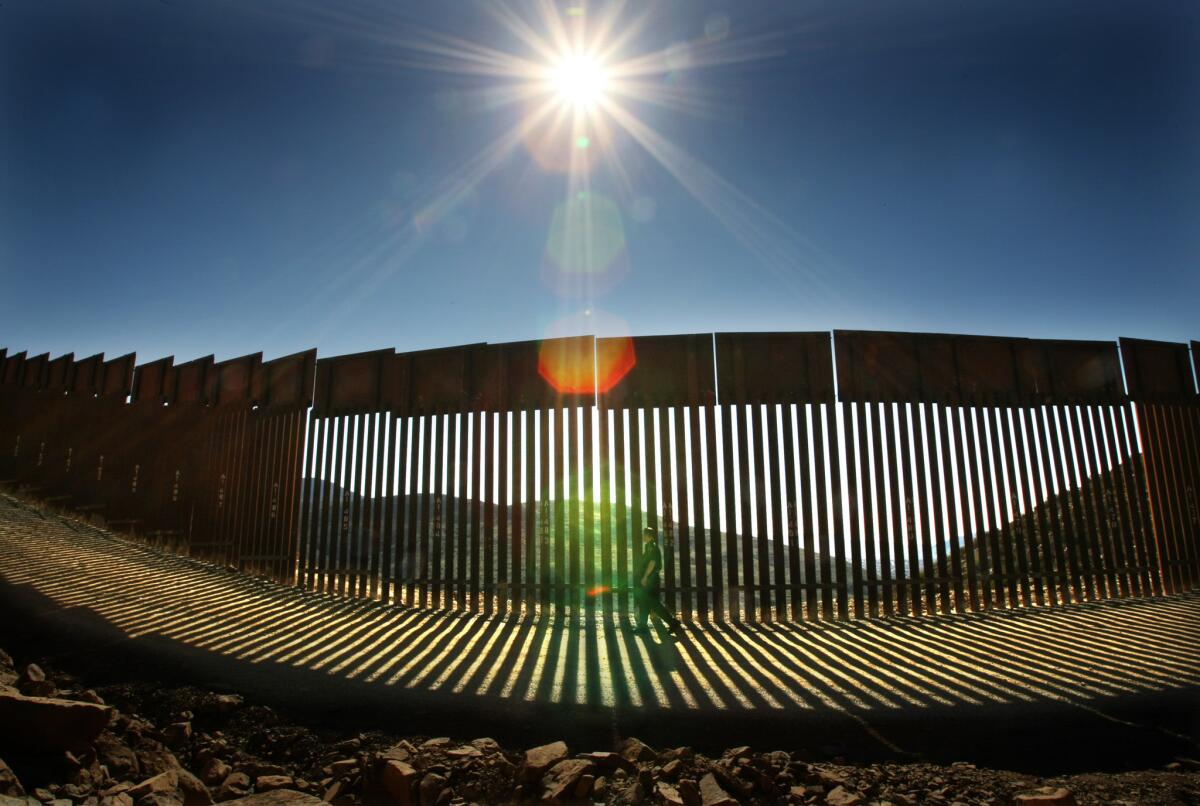 A 3.6-mile stretch of the U.S.-Mexico border fence, completed in 2009, cost $57.7 million to build through rugged terrain east of San Ysidro. A wall along the entire border could cost between $12 billion and $38 billion.