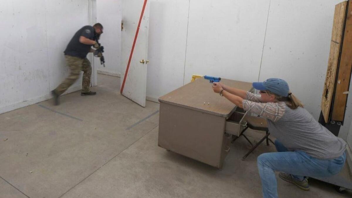 A 5th-grade teacher undergoes active shooter training in Spanish Fork Canyon, Utah, in June.