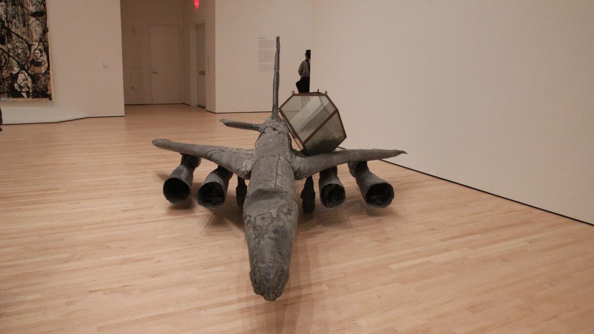 Another of the Fisher Collection's more interesting pieces: German artist Anselm Kiefer's "Melancholia" from 1990-91. Made of lead, it's an airplane that harkens to the devastating bombing campaigns of World War II.