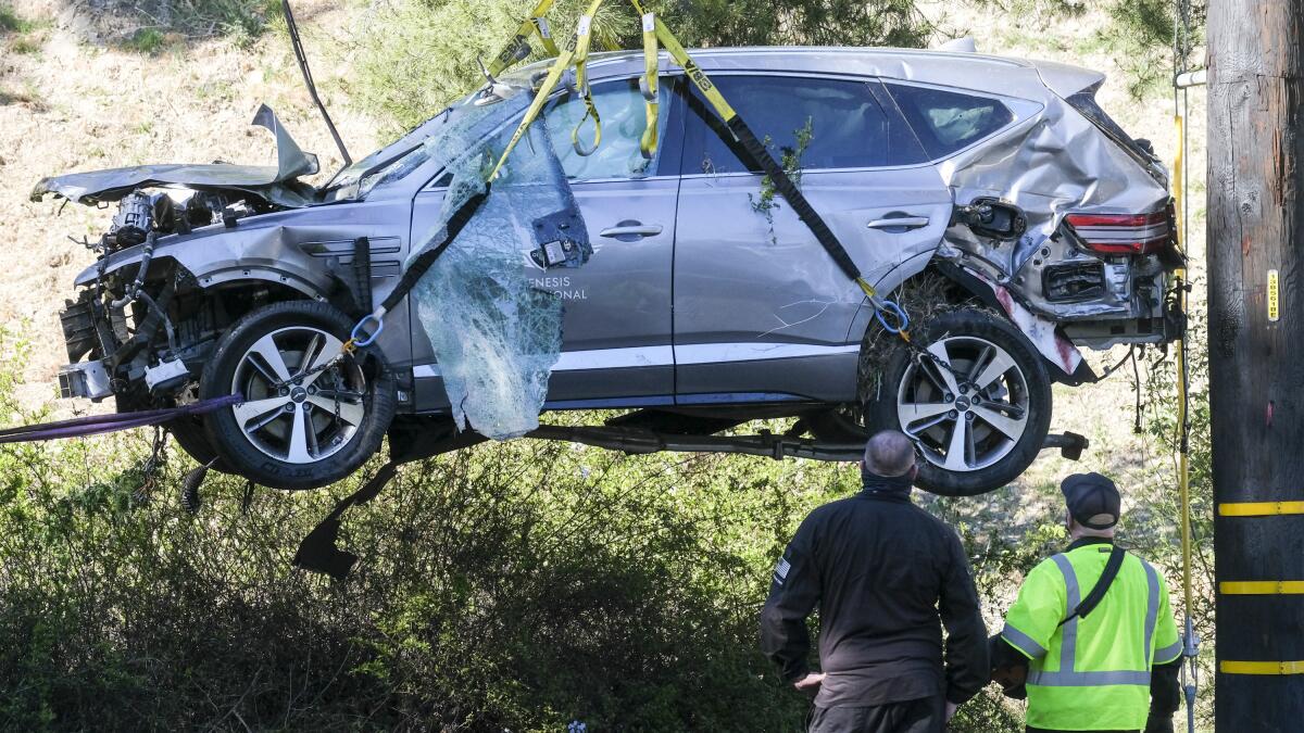 The Sports Report: Tiger Woods breaks both legs in car accident - Los Angeles Times
