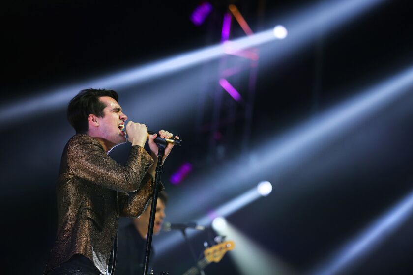 Brendon Urie of Panic! at the Disco performs in December. The band's new album entered the Billboard 200 chart at No. 1.