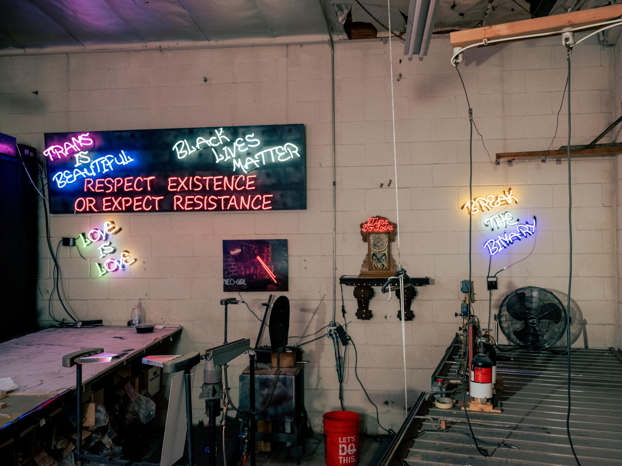 Rose's workshop, full of neon signage.