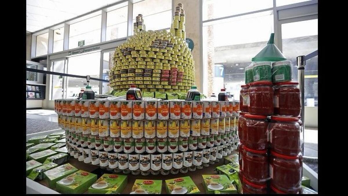 This structure built by TCA Architects is on display at John Wayne Airport during Canstruction Orange County, an annual month-long food drive and design competition. The sculpture has 2,000 cans.