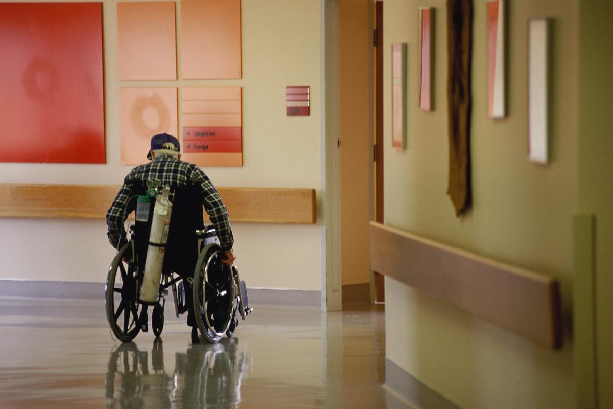 Elderly man in wheelchair