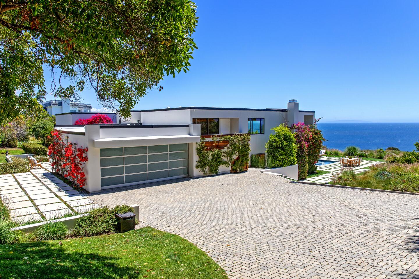 The longtime Malibu home of Robert Conrad sits across from the beach where "The Wild, Wild West" actor learned to surf in the 1950s. A beach volleyball court, a putting green and a saltwater swimming pool accompany the home on a roughly three-quarter-acre lot.