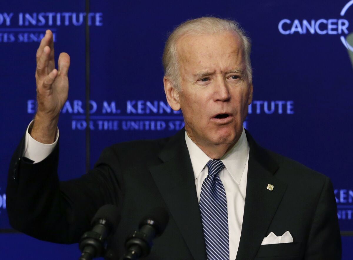Joe Biden gestures while speaking in 2016 at an event in Boston.