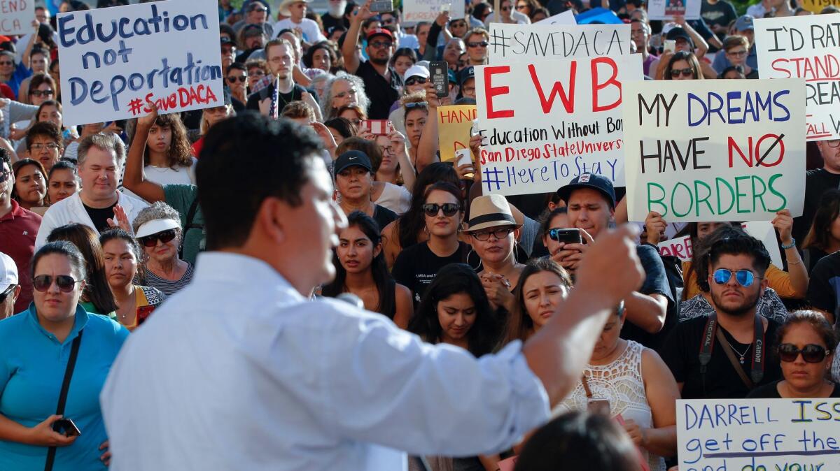 Christian Ramirez of Alliance San Diego spoke to the crowd at the County Administration building the day the DACA announcement came out before turning over the rally to DACA recipients.