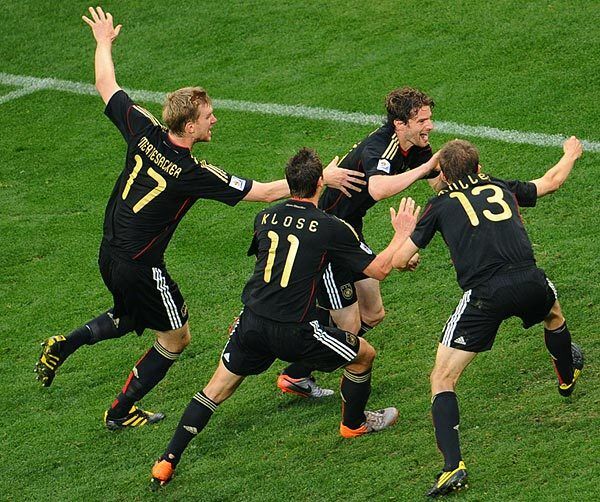 Germany's defender Arne Friedrich, second from right, celebrates with teammates after scoring his team's third goal, of four, in their victory over Argentina on Saturday.