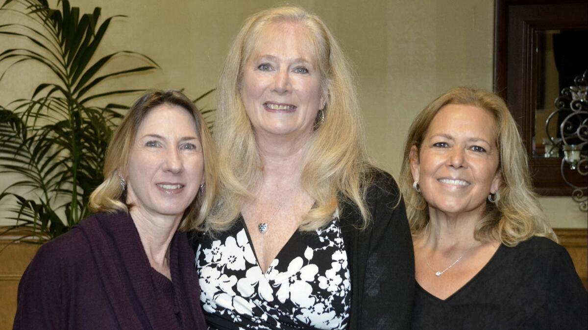 Among the guild's newly sworn officers are Treasurer Jill Kessler, from left, First Vice President Nancy Wiggins, and Public Relations Officer Teresa Garcia.