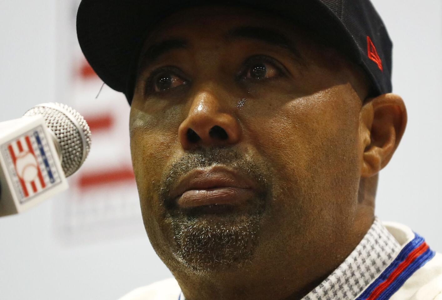 Harold Baines cries during a news conference announcing the Hall of Fame at the winter meetings in Las Vegas on Dec. 10. 2018.