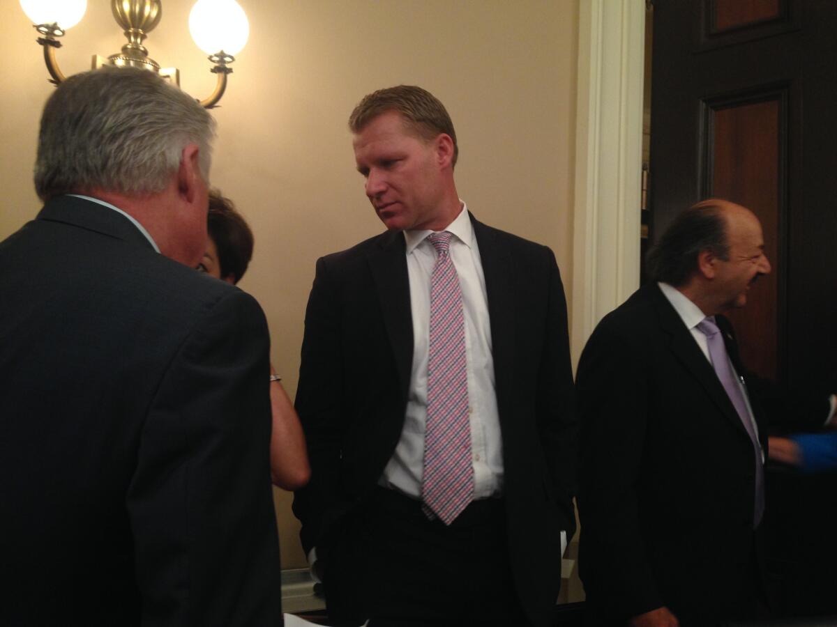 Assemblyman Chad Mayes (R-Yucca Valley), center, appears at a Assembly Republican caucus news conference on transportation funding on Monday.