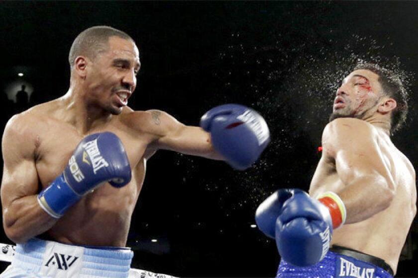 Andre Ward connects with a left to Edwin Rodriguez during the 12th round of their super-middleweight title boxing match at Citizens Business Bank Arena in Ontario, Calif. Ward won by unanimous decision, retaining his title.