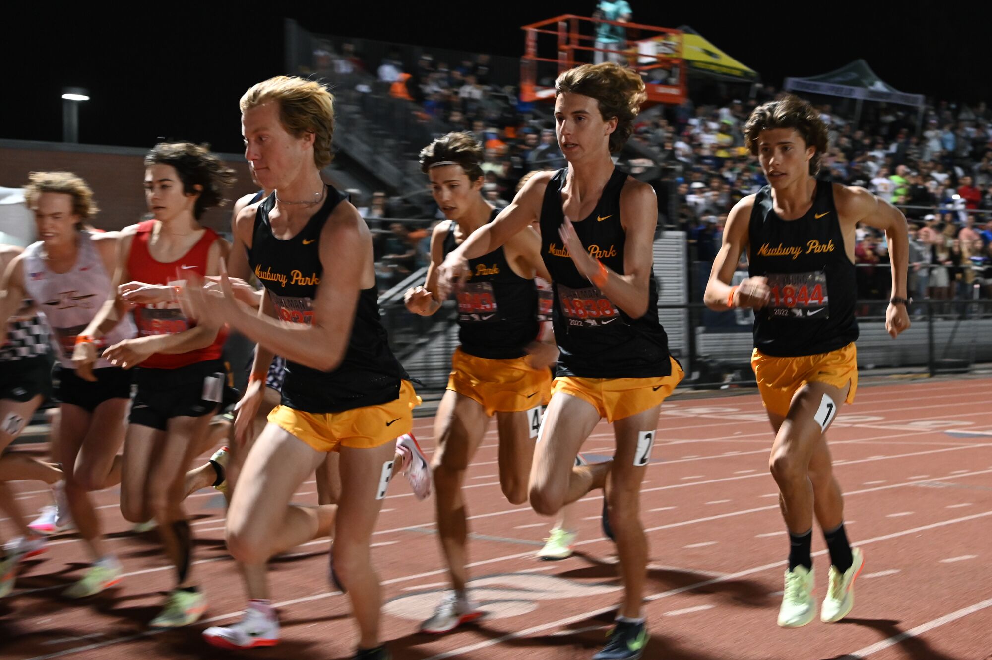 Newbury Park's Aaron Sahlman, Leo Young, Colin Sahlman and Lex Young, from left, start the boys' 3200 meter run