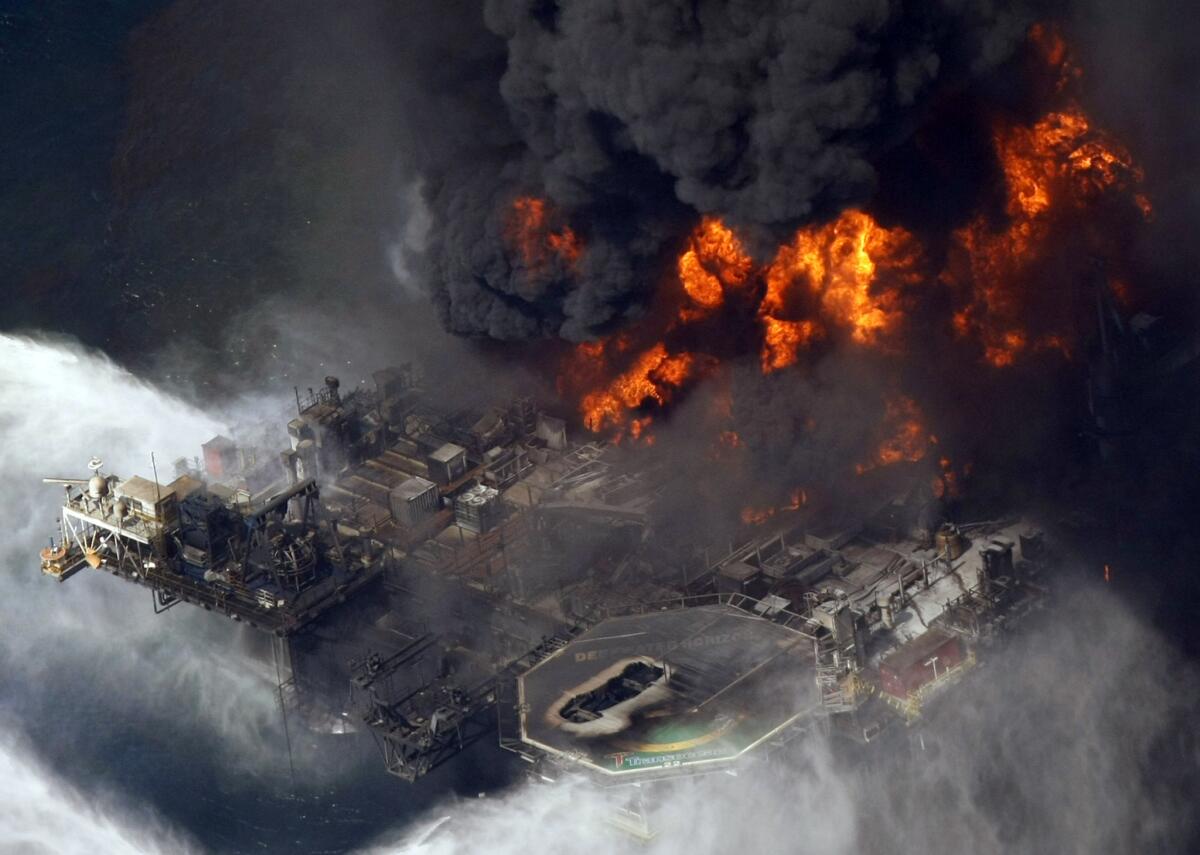 The Deepwater Horizon oil rig burns in the Gulf of Mexico on April 21, 2010. Chemical fingerprinting shows that oil sheen that began appearing near the disaster site two years later leaked from the rig wreckage on the sea floor.