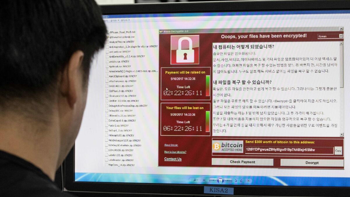 A photo taken Monday shows staff at the Korea Internet and Security Agency observing the so-called WannaCry ransomware, which locks computer files until users pay a ransom for a digital key.