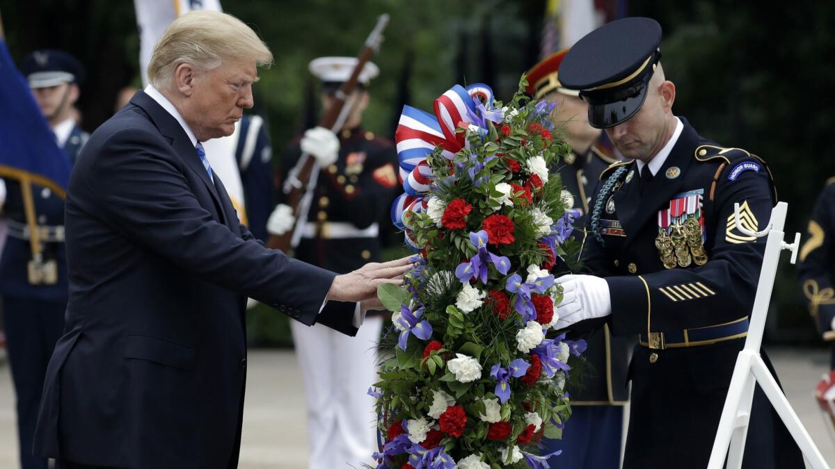 President Trump lays a wreath at the Tomb of the Unknown Soldier at Arlington National Cemetery on Memorial Day in Arlington, Va.